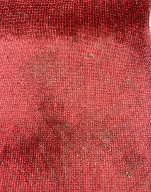TTC red fabric seat grime and dirt stain